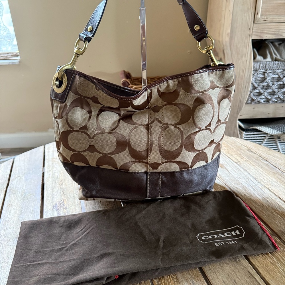 Coach Y2K signature shoulder bag have been store used once 10627